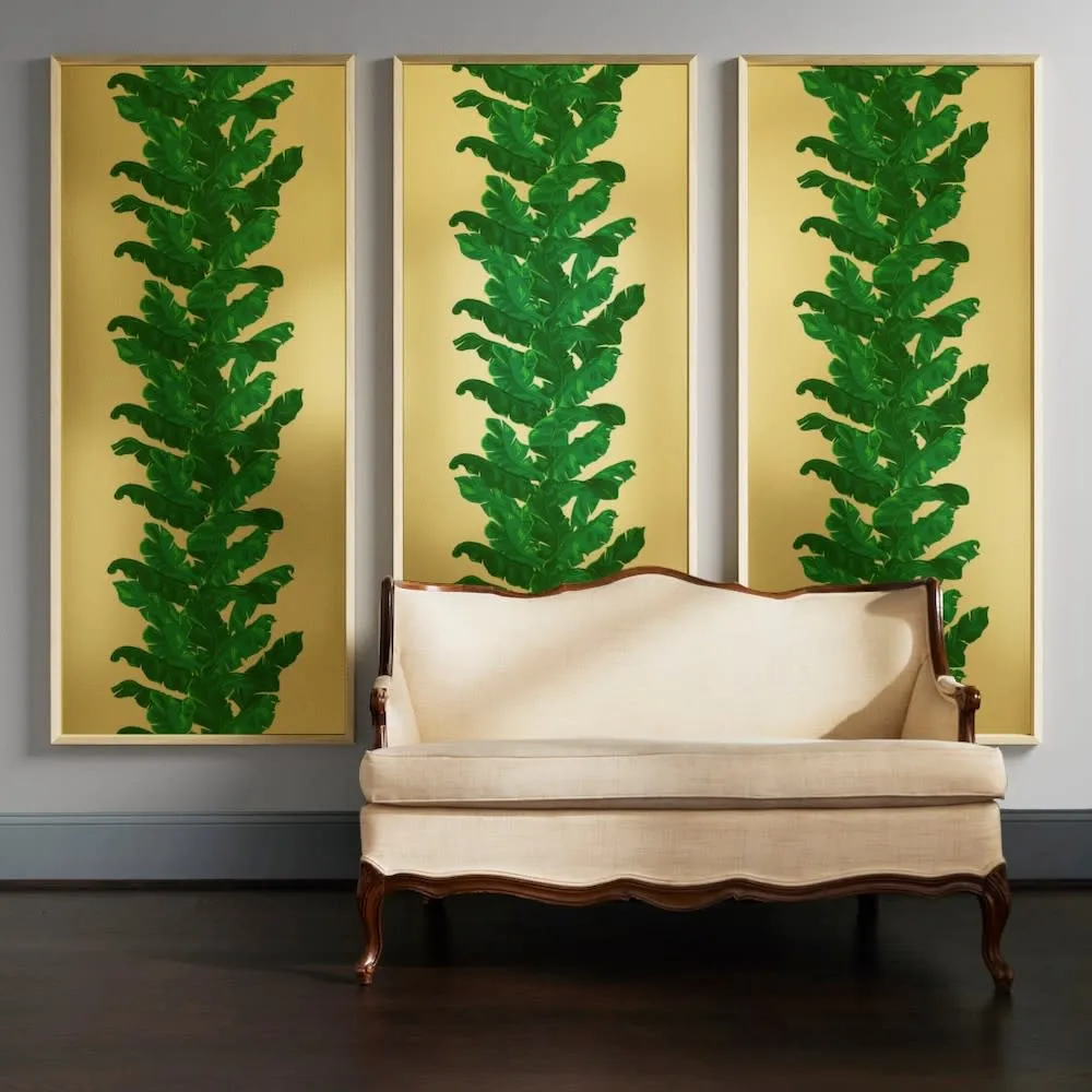 Framed panels of tropical gold metallic wallpaper
